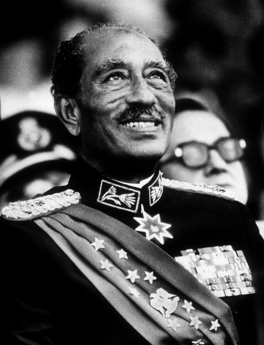 The Last Smile-Egyptian President Anwar Sadat smiles moments before he was assassinated  at the annual military parade. Oct. 6, 1981.


 : Sadat-Mubarak 1978-1981 : BILL FOLEY 