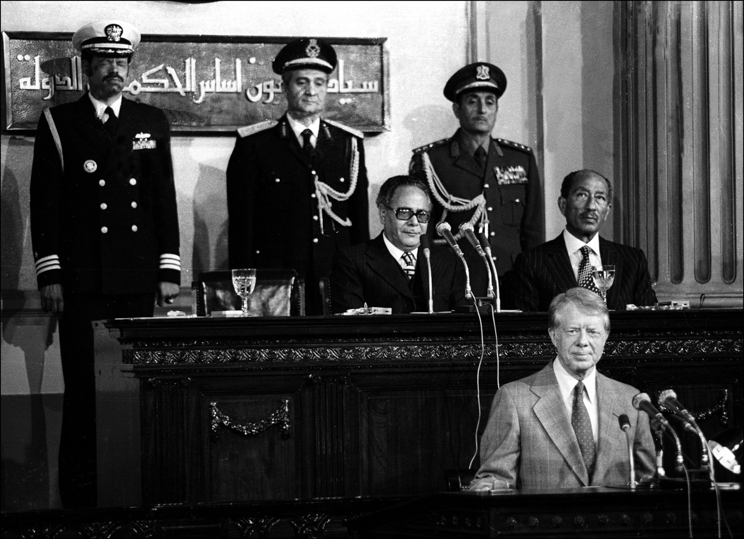 President Jimmy Carter addresses the Egyptian Parliament in Cairo, 1979 as President Sadat looks on. : Sadat-Mubarak 1978-1981 : BILL FOLEY 