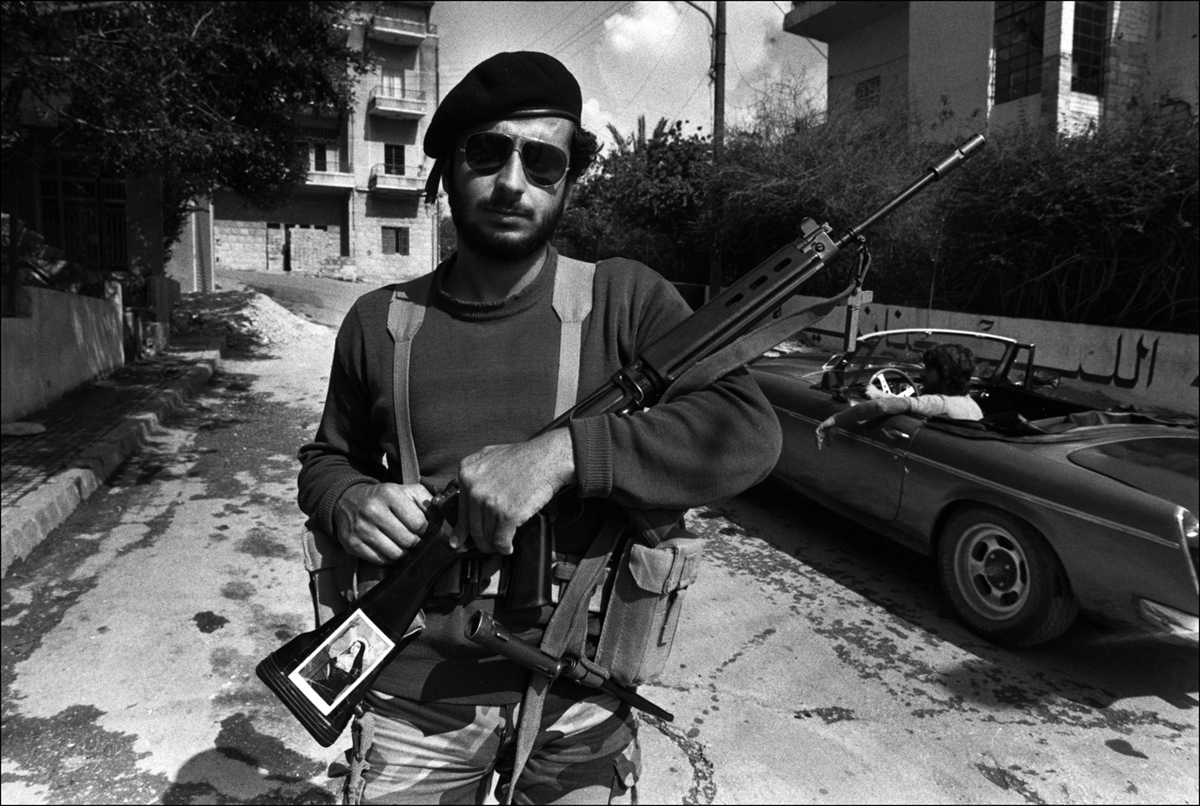 Christian Militaman stands in road, Ashrefiyeh, East Beirut. 1981. : Lebanon 1981-2008 : BILL FOLEY 