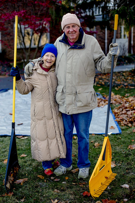 Beth and Carl relax for a minute while raking leaves 2019.
 : Portraits  : BILL FOLEY 