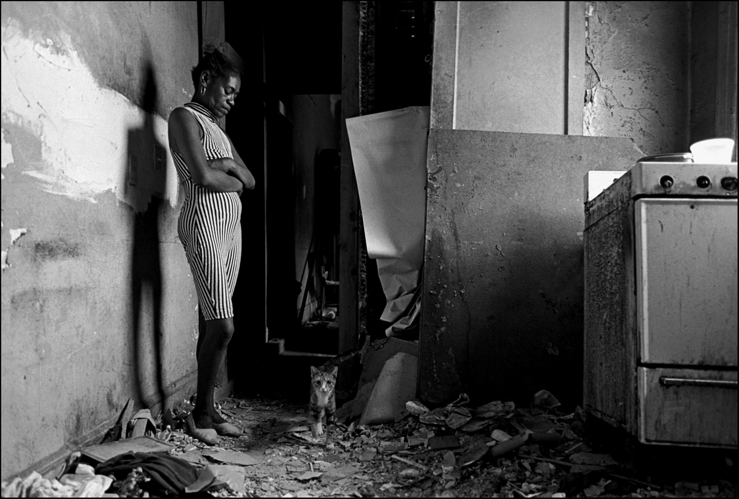 Barbara in her apartment with her cat. 1995 Barbara was a squatter at start of the Carmel Hill project. : Carmel Hill Harlem NYC 1995-2000 : BILL FOLEY 