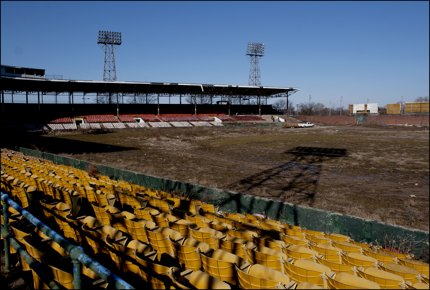 Yellow and red seats under shadow of lights : Bush Stadium 2012 : BILL FOLEY 