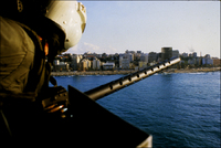 Flying into LZ on corniche, West Beirut. .50 caliber machine gun at the ready.
1983 - © 2023 Bill Foley. All Rights Reserved.