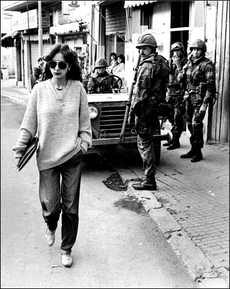 On Patrol, US Marines watch a Lebanese student pass by their Patrol, East Beirut 1982. : USMC in Beirut 1982-1983 : BILL FOLEY 