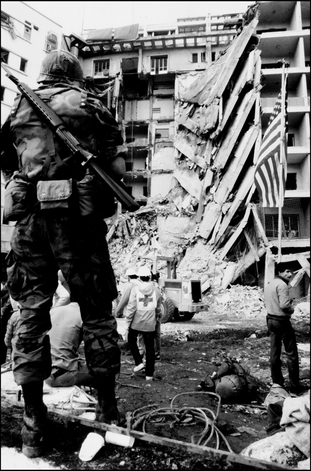 US Marine observes continuing clean up of the US Embassy that was destroyed by a truck bomb, April 1983. : USMC in Beirut 1982-1983 : BILL FOLEY 