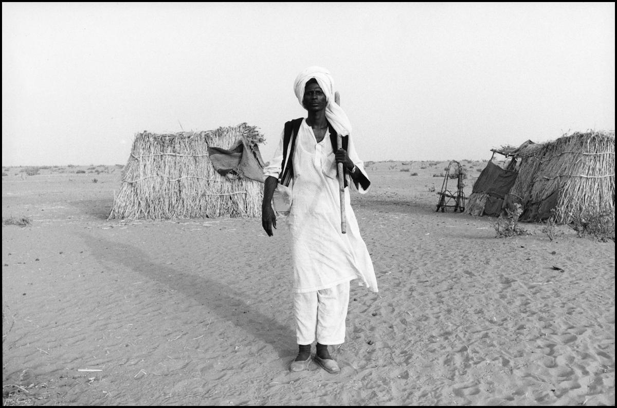 Posing in "front yard" Western Sudan.
 : Portraits  : BILL FOLEY 