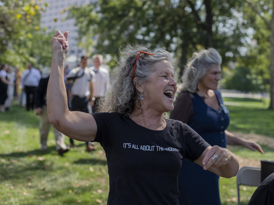 Lisa Colleen Sings as procession arrives at start of the 2022 Festival of Faiths. : Festival of Faith, Back in Person! 2022. Military Park Downtown, Indianapolis, September 18, 2022! And Festival of Faith Pre-Pandemic 2019! : BILL FOLEY 