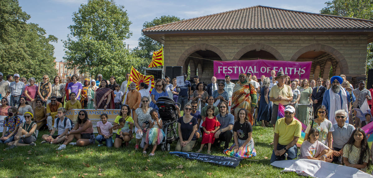 Participants in the Festival of Faith procession relax. : Festival of Faith, Back in Person! 2022. Military Park Downtown, Indianapolis, September 18, 2022! And Festival of Faith Pre-Pandemic 2019! : BILL FOLEY 