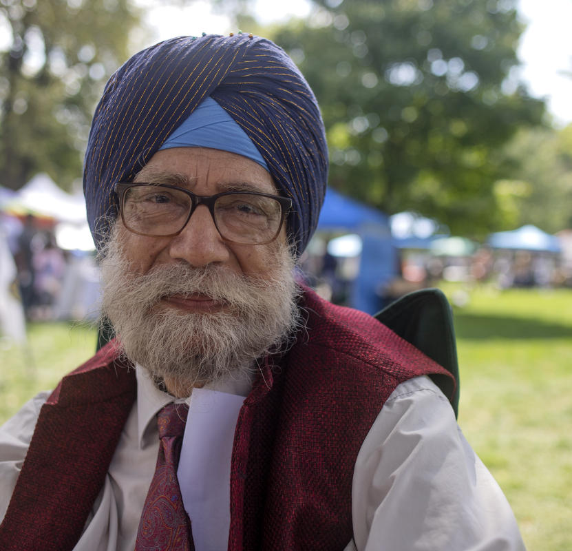 K.P. Singh smiles at the 2022 Festival of Faiths. : Festival of Faith, Back in Person! 2022. Military Park Downtown, Indianapolis, September 18, 2022! And Festival of Faith Pre-Pandemic 2019! : BILL FOLEY 