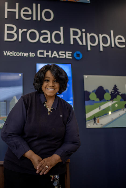 Ms. Annetta, Lead Teller at Chase bank in Broadripple, Indianapolis the day before there branch closed. Feb.8, 2023.

 : Portraits  : BILL FOLEY 